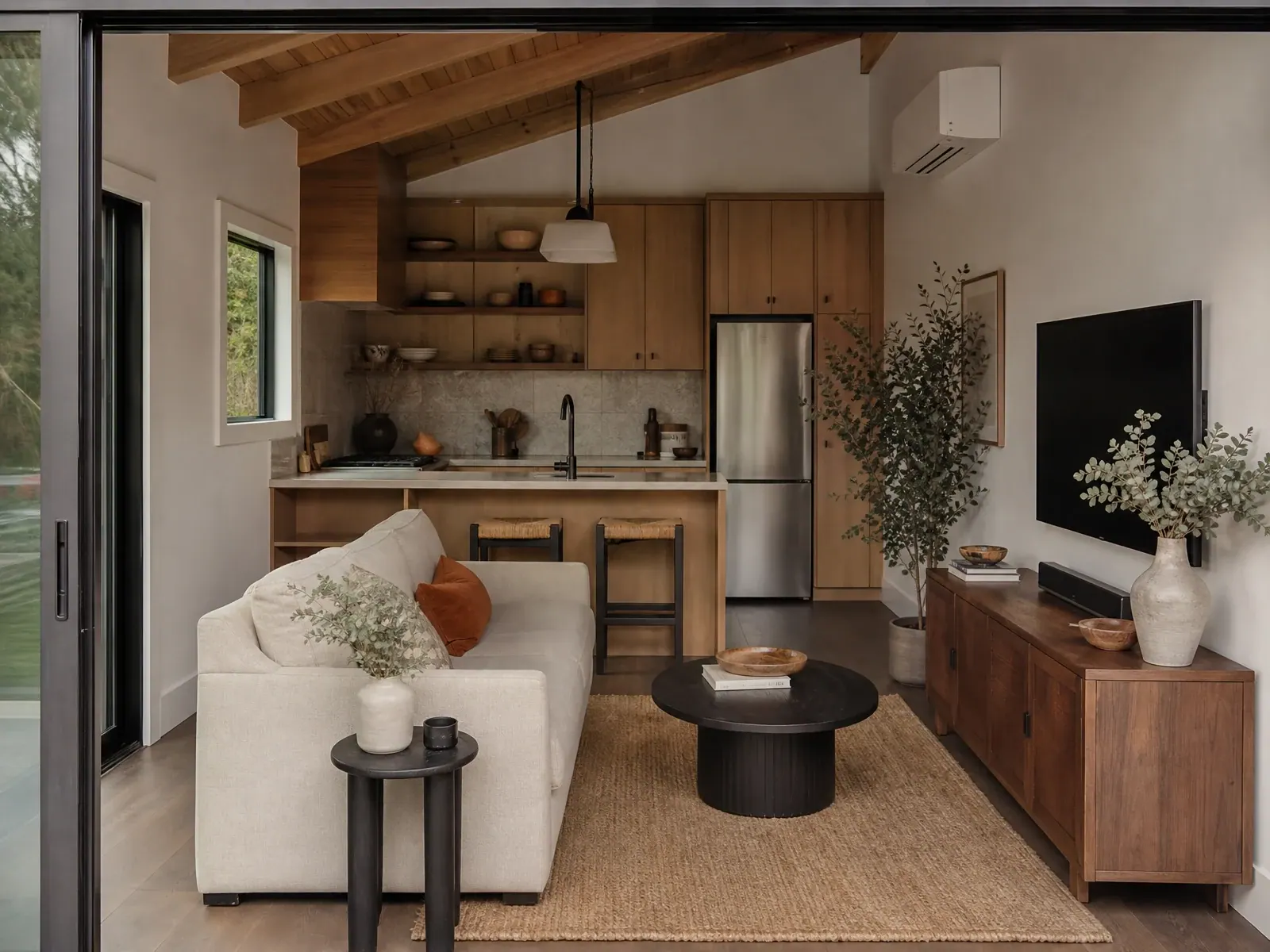 Compact ADU interior with efficient storage and natural light Compact ADU interior with efficient storage and natural light