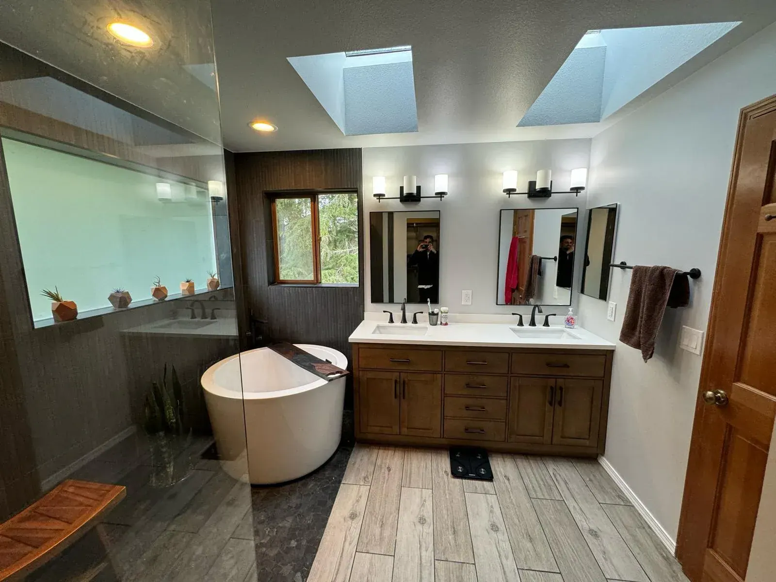 Finished basement bathroom detail with tile and fixtures in a Renton lower-level remodel