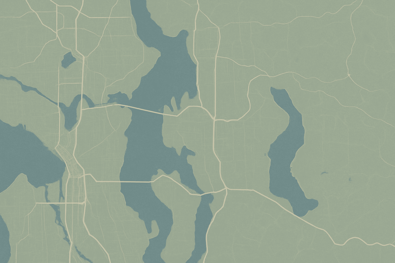 A label-free topographic schematic of the Seattle-Eastside geography communicates the service area visually without requ
