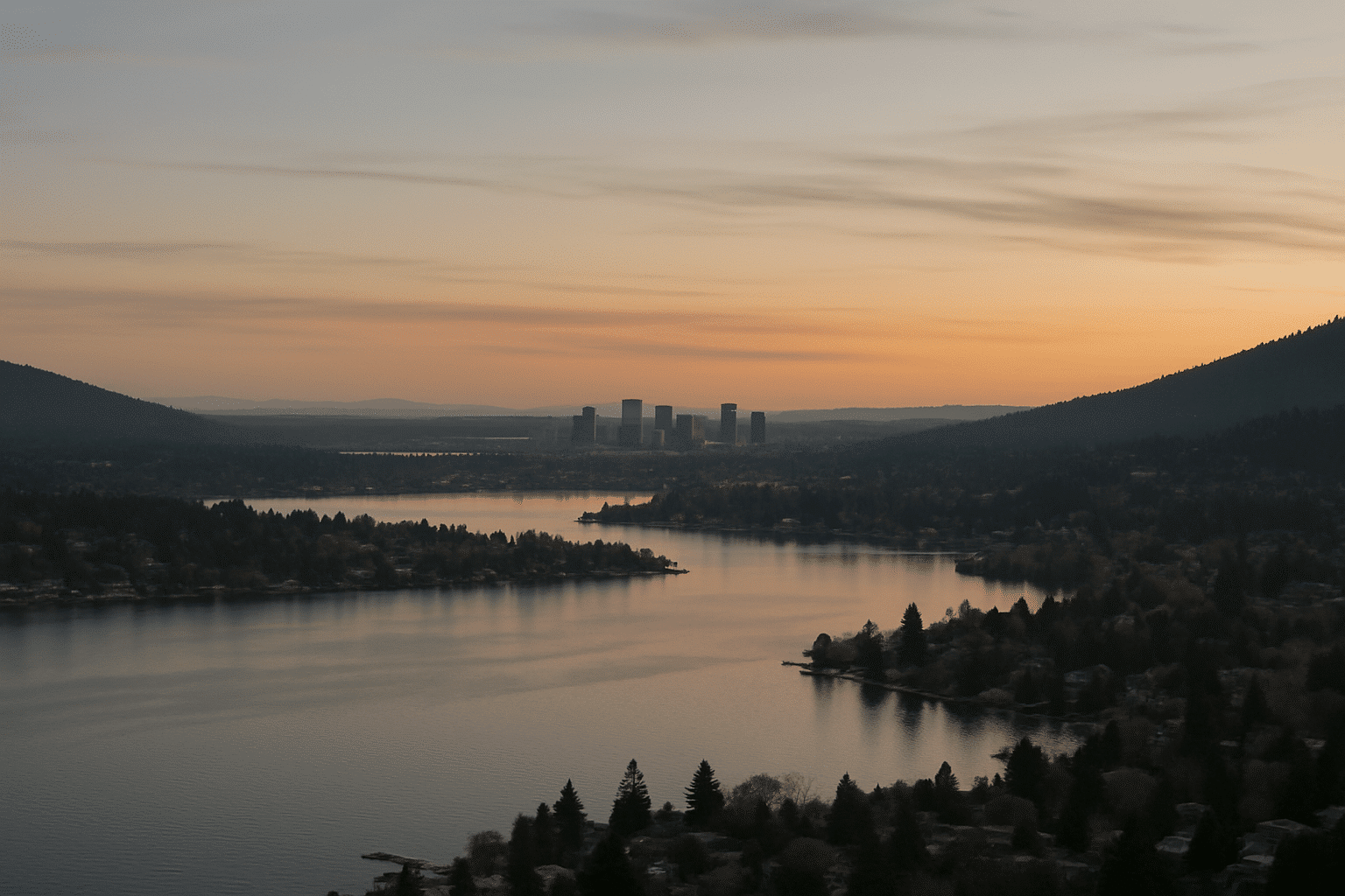 A sweeping regional geography shot communicates the breadth of the Greater Seattle service area without identifying any 